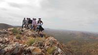 Day 3 - The whole team take a snap amid a stunning landscape